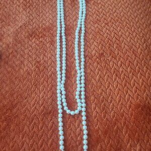 Long length pearl strand